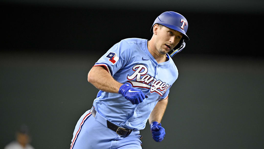 Texas Rangers left fielder Wyatt Langford (36) rounds the bases after he hits a home run against the Miami Marlins during the sixth inning at Globe Life Field. 