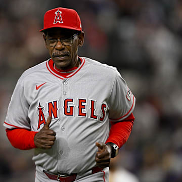 Apr 15, 2025; Arlington, Texas, USA; Los Angeles Angels manager Ron Washington trots back to the dugout during the eighth inning against the Texas Rangers at Globe Life Field. All MLB players will be wearing the number 42 on Jackie Robinson Day to commemorate Robinson making his major league debut in 1947. Mandatory Credit: Jerome Miron-Imagn Images