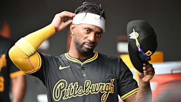 Sep 11, 2025; Baltimore, Maryland, USA;  Pittsburgh Pirates designated hitter Andrew McCutchen (22) stands in the dugout before the game between the Baltimore Orioles and the Pittsburgh Pirates at Oriole Park at Camden Yards. Mandatory Credit: James A. Pittman-Imagn Images