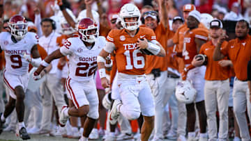 Oct 11, 2025; Dallas, Texas, USA; Texas Longhorns quarterback Arch Manning (16) runs with the ball during the game between the Texas Longhorns and the Oklahoma Sooners at the Cotton Bowl. Mandatory Credit: Jerome Miron-Imagn Images