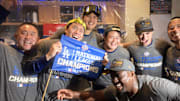 Oct 20, 2024; Los Angeles, California, USA; Los Angeles Dodgers pitcher Yoshinobu Yamamoto (18) and designated hitter Shohei Ohtani (17) celebrate in the clubhouse after defeating the New York Mets in game six of the NLCS for the 2024 MLB playoffs at Dodger Stadium. 