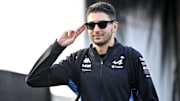 Oct 20, 2024; Austin, Texas, USA; BWT Alpine F1 Team driver Esteban Ocon (31) of Team France walks through the track entrance before the 2024 Formula One US Grand Prix at Circuit of the Americas. Mandatory Credit: Jerome Miron-Imagn Images