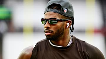 Cleveland Browns quarterback Shedeur Sanders (12) warms up before the game against the San Francisco 49ers at Huntington Bank Field. 