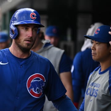 Sep 1, 2024; Washington, District of Columbia, USA; Chicago Cubs center fielder Cody Bellinger (24) celebrates in the dugout after scoring a run against the Washington Nationals during the seventh inning at Nationals Park.