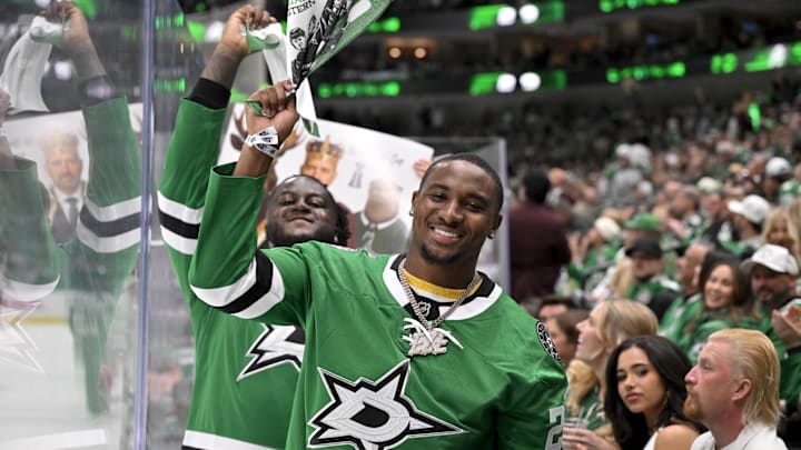 Dallas Cowboys rookie Donovan Ezeiruaku poses for a photo during the first period between the Dallas Stars and the Edmonton Oilers. Dallas Cowboys rookie Donovan Ezeiruaku poses for a photo during the first period between the Dallas Stars and the Edmonton Oilers.