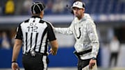 Nov 10, 2024; Indianapolis, Indiana, USA; Indianapolis Colts Indianapolis Colts head coach Shane Steichen talks with a referee during the second half against the Buffalo Bills at Lucas Oil Stadium. 