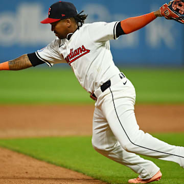 Sep 14, 2024; Cleveland, Ohio, USA; Cleveland Guardians third baseman Jose Ramirez (11) makes an error on a hit by Tampa Bay Rays catcher Logan Driscoll (not pictured) during the eighth inning at Progressive Field. Mandatory Credit: Ken Blaze-Imagn Images