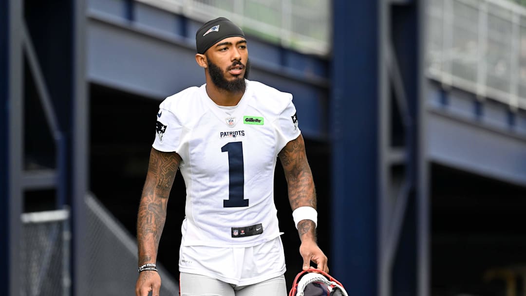 Jun 9, 2025; Foxborough, MA, USA; New England Patriots wide receiver Ja'Lynn Polk (1) walks to the practice fields at Gillette Stadium. Mandatory Credit: Eric Canha-Imagn Images
