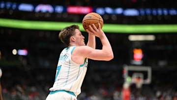 Oct 26, 2025; Washington, District of Columbia, USA; Charlotte Hornets guard Kon Knueppel (7) attempts.a shot against the Washington Wizards during the third quarter at Capital One Arena. Mandatory Credit: Rafael Suanes-Imagn Images