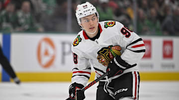 Nov 7, 2024; Dallas, Texas, USA; Chicago Blackhawks center Connor Bedard (98) skates against the Dallas Stars during the first period at the American Airlines Center. Mandatory Credit: Jerome Miron-Imagn Images