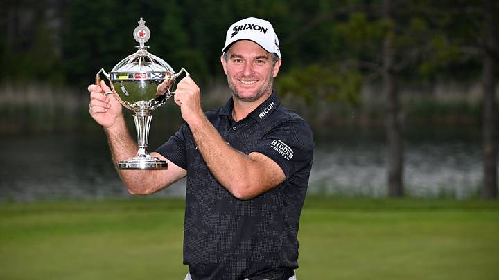 Ryan Fox poses with the winner's trophy following his victory at the 2025 RBC Canadian Open at TPC Toronto