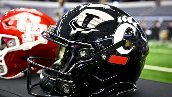 Jul 12, 2023; Arlington, TX, USA; A view of the Cincinnati Bearcats helmet and logo during Big 12 football media day at AT&T Stadium. Mandatory Credit: Jerome Miron-Imagn Images