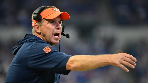 Denver Broncos Head Coach Sean Payton throws a challenge flag during the second half against the Indianapolis Colts at Lucas 