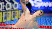 Aaron Shackell slaps the water after winning a 200-meter freestyle semifinals swim-off Sunday, June 16, 2024, during the second day of competition for the U.S. Olympic Team Swimming Trials at Lucas Oil Stadium in Indianapolis.