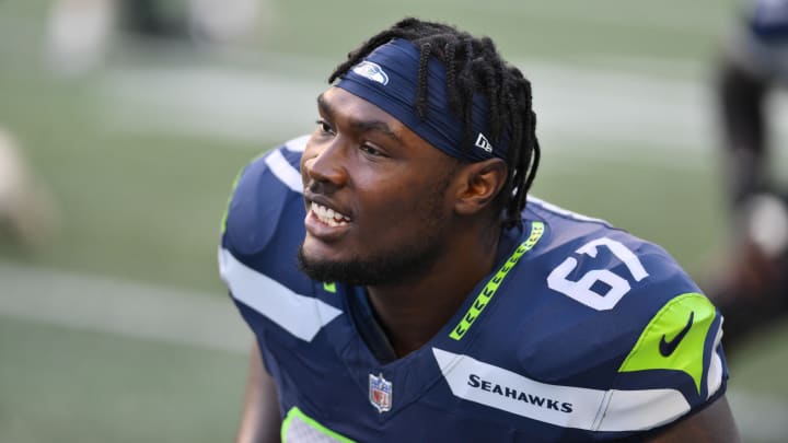 Aug 10, 2023; Seattle, Washington, USA; Seattle Seahawks offensive tackle Charles Cross (67) during warmups prior to the game at Lumen Field. Mandatory Credit: Steven Bisig-USA TODAY Sports