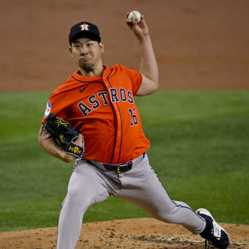 Aug 7, 2024; Arlington, Texas, USA;  Houston Astros starting pitcher Yusei Kikuchi (16) pitches against the Texas Rangers during the first inning at Globe Life Field.