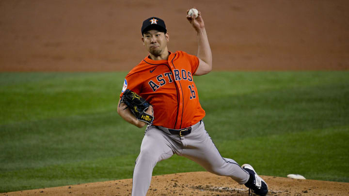 Aug 7, 2024; Arlington, Texas, USA;  Houston Astros starting pitcher Yusei Kikuchi (16) pitches against the Texas Rangers during the first inning at Globe Life Field.