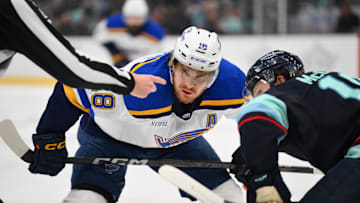 Apr 12, 2025; Seattle, Washington, USA; St. Louis Blues center Robert Thomas (18) waits for the puck to drop during a face off in the first period against the Seattle Kraken at Climate Pledge Arena. Mandatory Credit: Steven Bisig-Imagn Images