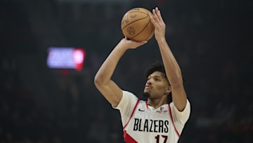 Mar 21, 2025; Portland, Oregon, USA; Portland Trail Blazers guard Shaedon Sharpe (17) shoots a jump shot during the first half against the Denver Nuggets at Moda Center. Mandatory Credit: Troy Wayrynen-Imagn Images