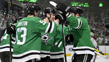 May 15, 2024; Dallas, Texas, USA; Dallas Stars defenseman Miro Heiskanen (4) and left wing Jason Robertson (21) and center Wyatt Johnston (53) and left wing Jamie Benn (14) celebrates a power play goal scored by Heiskanen against the Colorado Avalanche during the second period in game five of the second round of the 2024 Stanley Cup Playoffs at American Airlines Center. Mandatory Credit: Jerome Miron-USA TODAY Sports