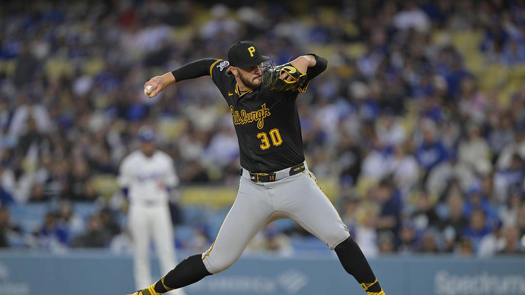 Apr 25, 2025; Los Angeles, California, USA;  Pittsburgh Pirates starting pitcher Paul Skenes (30) pitches during the first inning against the Los Angeles Dodgers at Dodger Stadium. Mandatory Credit: Jayne Kamin-Oncea-Imagn Images