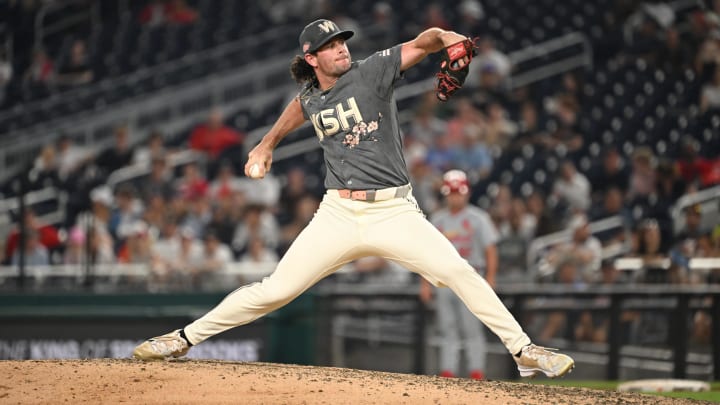 Jul 5, 2024; Washington, District of Columbia, USA; Washington Nationals relief pitcher Kyle Finnegan (67) throws a pitch against the St. Louis Cardinals during the ninth inning at Nationals Park. Mandatory Credit: Rafael Suanes-USA TODAY Sports