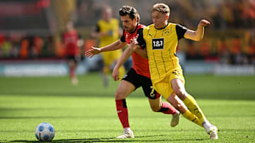 Borussia Dortmund und Bayer Leverkusen kämpfen um die Champions League Borussia Dortmund und Bayer Leverkusen kämpfen um die Champions League