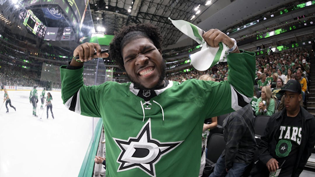 Dallas Cowboys 2025 first round pick Tyler Booker poses for a photo during the first period between the Dallas Stars and the Winnipeg Jets. Dallas Cowboys 2025 first round pick Tyler Booker poses for a photo during the first period between the Dallas Stars and the Winnipeg Jets.