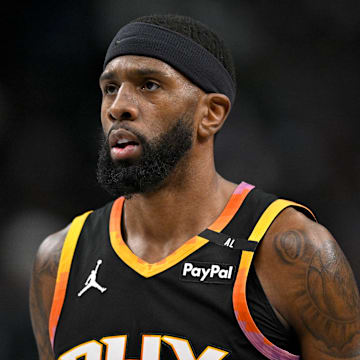 Mar 9, 2025; Dallas, Texas, USA; Phoenix Suns forward Royce O'Neale (00) during the game between the Dallas Mavericks and the Phoenix Suns at American Airlines Center. Mandatory Credit: Jerome Miron-Imagn Images