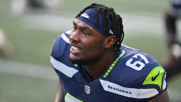 Seattle Seahawks offensive tackle Charles Cross during warmups prior to the game.
