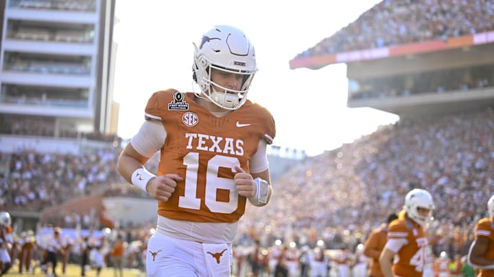 Texas Longhorns quarterback Arch Manning (16) takes the field before the game between the Texas Longhorns and the Clemson Tigers in the CFP National Playoff First Round at Darrell K Royal-Texas Memorial Stadium.