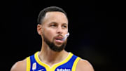 Oct 21, 2025; Los Angeles, California, USA; Golden State Warriors guard Stephen Curry (30) during the first half against the Los Angeles Lakers at Crypto.com Arena. Mandatory Credit: William Liang-Imagn Images