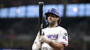 Texas Rangers shortstop Josh Smith (8) walks to the on deck circle during the first inning against the Minnesota Twins at Globe Life Field.