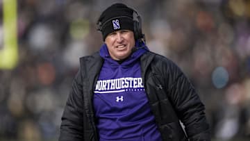 Nov 19, 2022; West Lafayette, Indiana, USA;  Northwestern Wildcats head coach Pat Fitzgerald walks the sidelines during the second quarter against the Purdue Boilermakers at Ross-Ade Stadium. Mandatory Credit: Marc Lebryk-Imagn Images