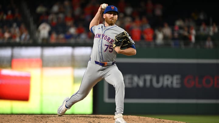 Jul 1, 2024; Washington, District of Columbia, USA; New York Mets relief pitcher Reed Garrett (75) prepares the throw a pitch against the Washington Nationals during the tenth inning at Nationals Park. Mandatory Credit: Rafael Suanes-USA TODAY Sports