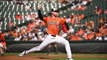 Jun 28, 2025; Baltimore, Maryland, USA; Baltimore Orioles relief pitcher Scott Blewett (67) throws a pitch against the Tampa Bay Rays during the second inning at Oriole Park at Camden Yards. Mandatory Credit: Rafael Suanes-Imagn Images