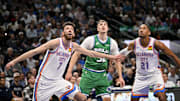 Oct 27, 2025; Dallas, Texas, USA; Oklahoma City Thunder center Chet Holmgren (7) and guard Aaron Wiggins (21) and Dallas Mavericks forward Cooper Flagg (32) look for the ball during the game between the Mavericks and the Thunder at the American Airlines Center. Mandatory Credit: Jerome Miron-Imagn Images