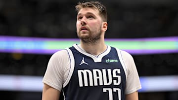 Dec 23, 2024; Dallas, Texas, USA; Dallas Mavericks guard Luka Doncic (77) checks the scoreboard during the second half against the Portland Trail Blazers at the American Airlines Center. Mandatory Credit: Jerome Miron-Imagn Images
