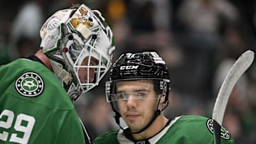 Oct 26, 2024; Dallas, Texas, USA; Dallas Stars goaltender Jake Oettinger (29) and center Logan Stankoven (11) celebrate on the ice after the Stars defeat the Chicago Blackhawks at the American Airlines Center. Mandatory Credit: Jerome Miron-Imagn Images
