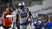 Feb 23, 2023; Seattle, WA, USA; St. Louis Battlehawks wide receiver Hakeem Butler (88) scores a touchdown while being pushed by St. Louis Battlehawks linebacker Tre Watson (33) during the second half at Lumen Field. St. Louis defeated Seattle 20-18. Mandatory Credit: Steven Bisig-USA TODAY Sports