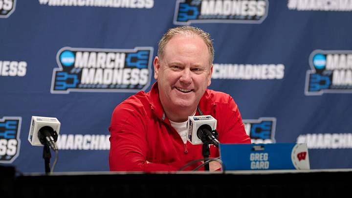 Mar 18, 2026; Portland, OR, USA; Wisconsin Badgers head coach Greg Gard answers questions from the media before a practice session ahead of the first round of the men's 2026 NCAA Tournament at Moda Center. Mandatory Credit: Troy Wayrynen-Imagn Images