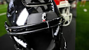 Jul 13, 2023; Arlington, TX, USA; A view of the Cincinnati Bearcats helmet and logo during the Big 12 football media day at AT&T Stadium. Mandatory Credit: Jerome Miron-Imagn Images