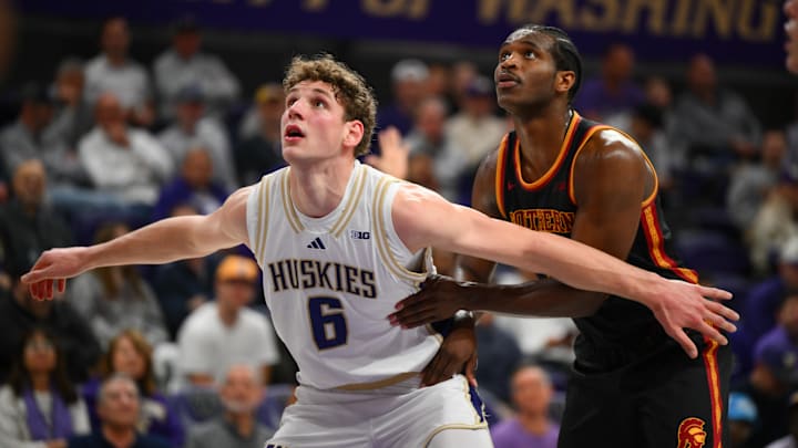 Mar 4, 2026; Seattle, Washington, USA; Washington Huskies forward Hannes Steinbach (6) blocks out Southern California Trojans forward Ezra Ausar (2) during the second half at Alaska Airlines Arena at Hec Edmundson Pavilion. Mandatory Credit: Steven Bisig-Imagn Images