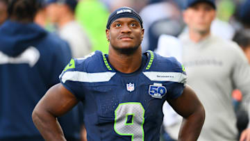 Sep 21, 2025; Seattle, Washington, USA; Seattle Seahawks running back Kenneth Walker III (9) looks on from the sideline during the second half against the New Orleans Saints at Lumen Field. Mandatory Credit: Steven Bisig-Imagn Images