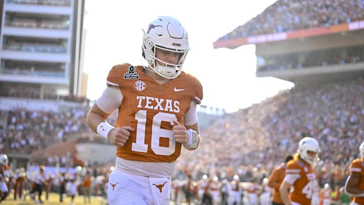 Dec 21, 2024; Austin, Texas, USA; Texas Longhorns quarterback Arch Manning (16) takes the field before the game between the Texas Longhorns and the Clemson Tigers in the CFP National Playoff First Round at Darrell K Royal-Texas Memorial Stadium. Mandatory Credit: Jerome Miron-Imagn Images