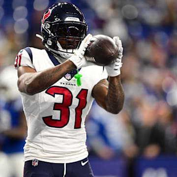 Jan 6, 2024; Indianapolis, Indiana, USA; Houston Texans running back Dameon Pierce (31) catches a pass during warm ups before a game against the Indianapolis Colts at Lucas Oil Stadium.