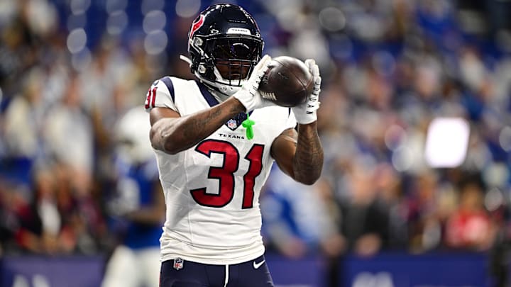 Jan 6, 2024; Indianapolis, Indiana, USA; Houston Texans running back Dameon Pierce (31) catches a pass during warm ups before a game against the Indianapolis Colts at Lucas Oil Stadium.