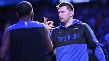 Dec 25, 2024; Dallas, Texas, USA; Dallas Mavericks guard Kyrie Irving (11) greets guard Luka Doncic (77) before the game against the Minnesota Timberwolves at the American Airlines Center. Mandatory Credit: Jerome Miron-Imagn Images