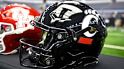 Jul 12, 2023; Arlington, TX, USA; A view of the Cincinnati Bearcats helmet and logo during Big 12 football media day at AT&T Stadium. Mandatory Credit: Jerome Miron-Imagn Images