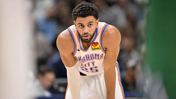 Oct 27, 2025; Dallas, Texas, USA; Oklahoma City Thunder guard Ajay Mitchell (25) looks on during the game between the Mavericks and the Thunder at the American Airlines Center. Mandatory Credit: Jerome Miron-Imagn Images